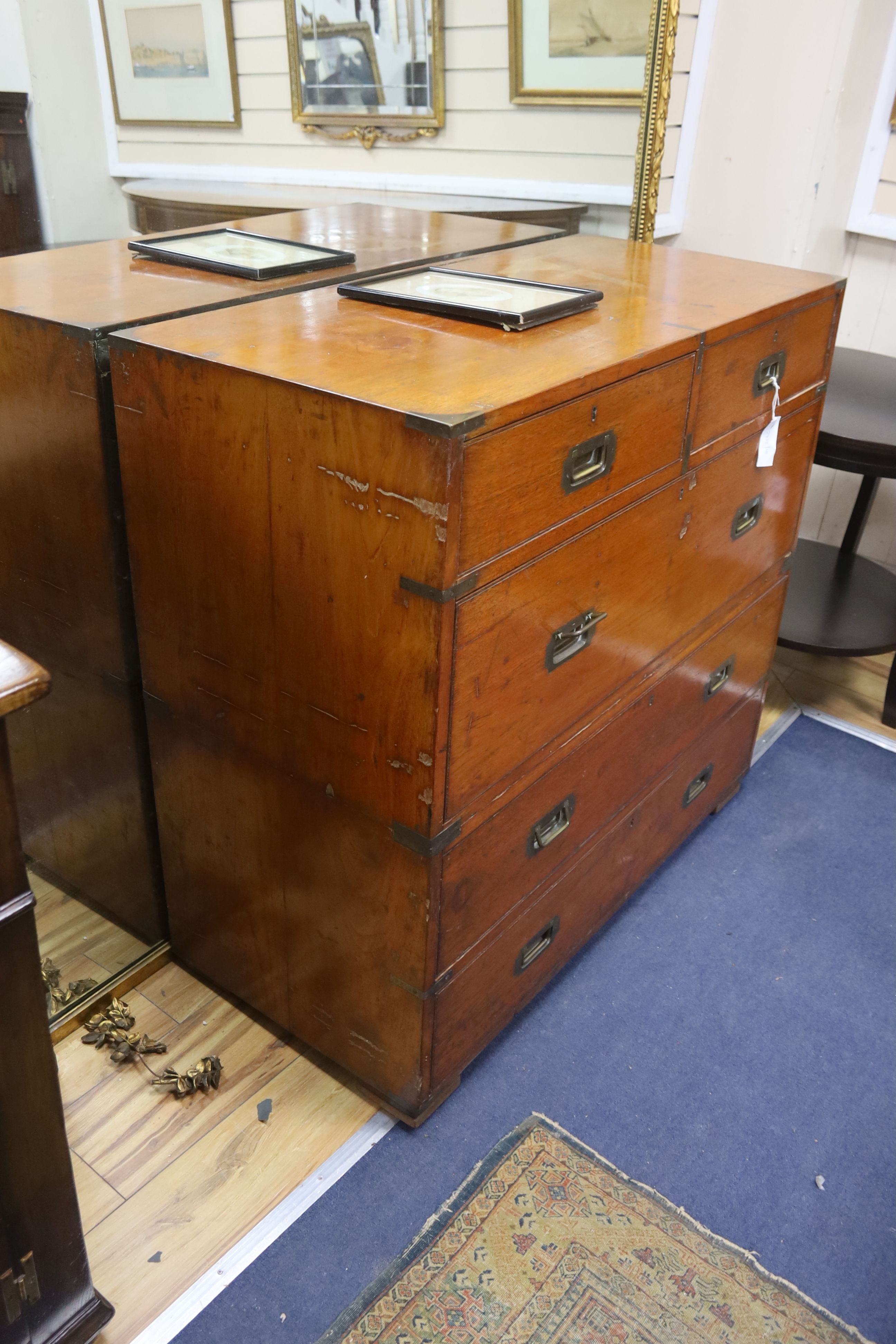 A Victorian camphorwood Army & Navy brass mounted two part military chest, width 99cm, depth 46cm, height 93cm